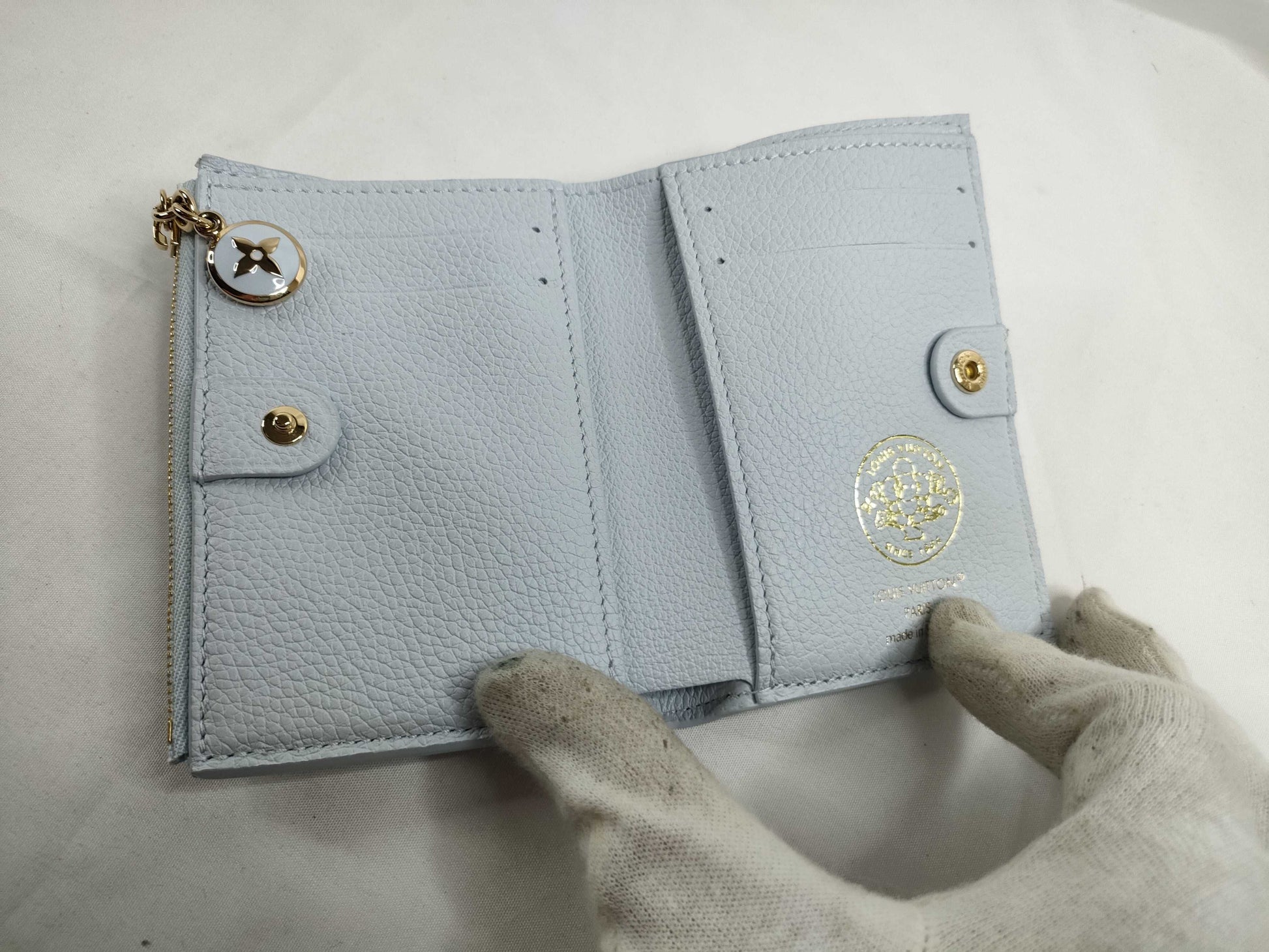 LOUIS VUITTON Brand new, unused Louis Vuitton Portefeuille Lisa in Azure Blue, Vivienne, with limited edition stamping, box, dust bag, wallet