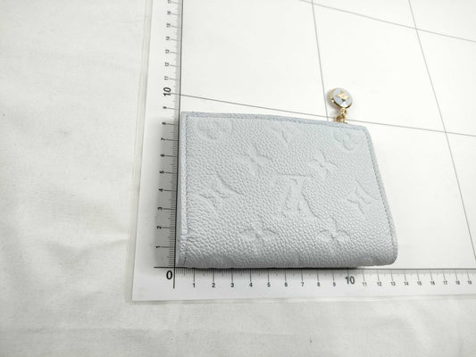 LOUIS VUITTON Brand new, unused Louis Vuitton Portefeuille Lisa in Azure Blue, Vivienne, with limited edition stamping, box, dust bag, wallet