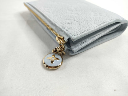 LOUIS VUITTON Brand new, unused Louis Vuitton Portefeuille Lisa in Azure Blue, Vivienne, with limited edition stamping, box, dust bag, wallet