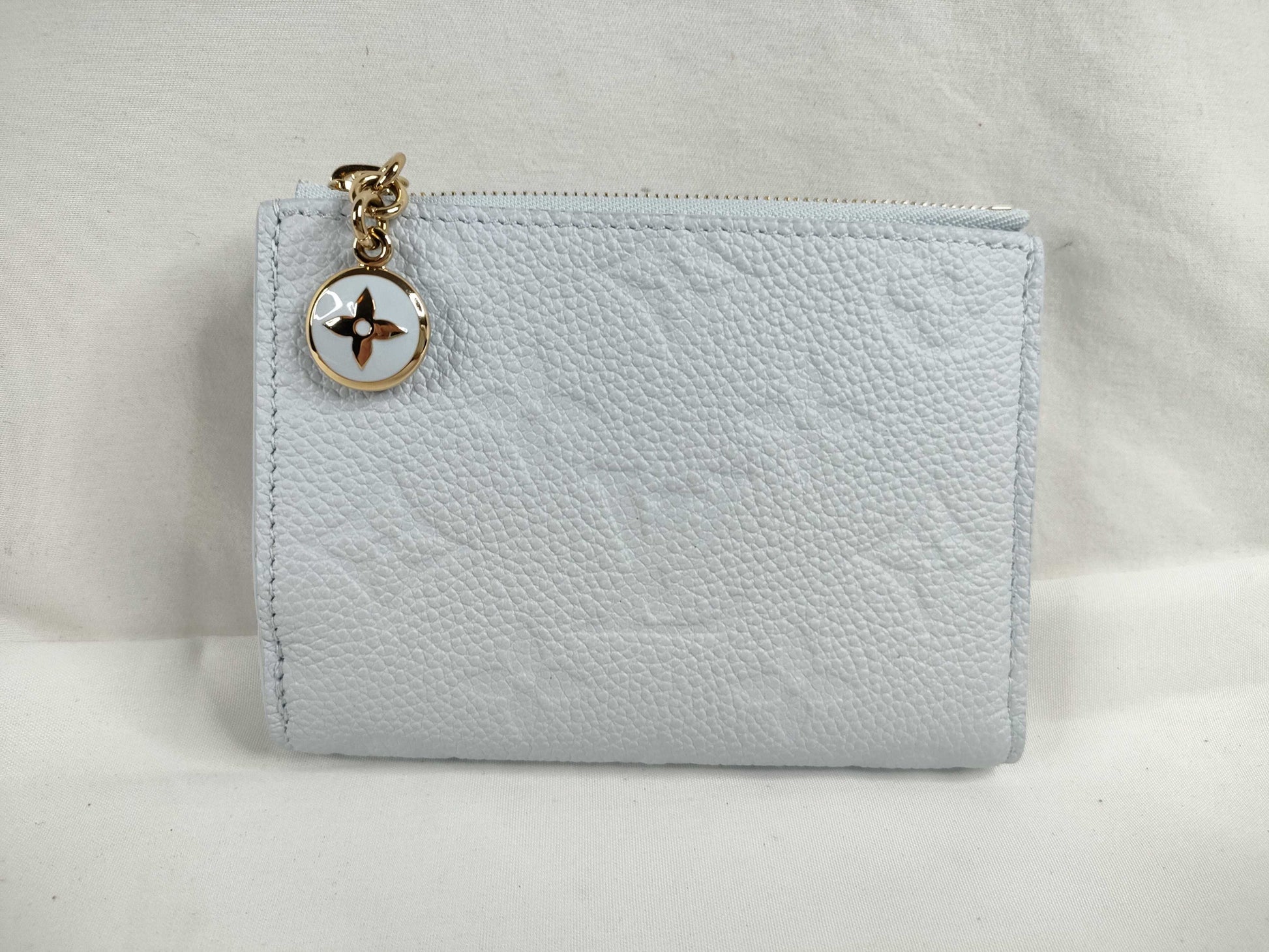 LOUIS VUITTON Brand new, unused Louis Vuitton Portefeuille Lisa in Azure Blue, Vivienne, with limited edition stamping, box, dust bag, wallet