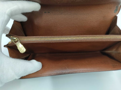 LOUIS VUITTON LV Monogram Pochette Porte Monnaie Credit Zippered Bi-fold Long Wallet