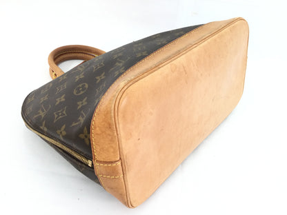 LOUIS VUITTON Monogram Alma Handbag