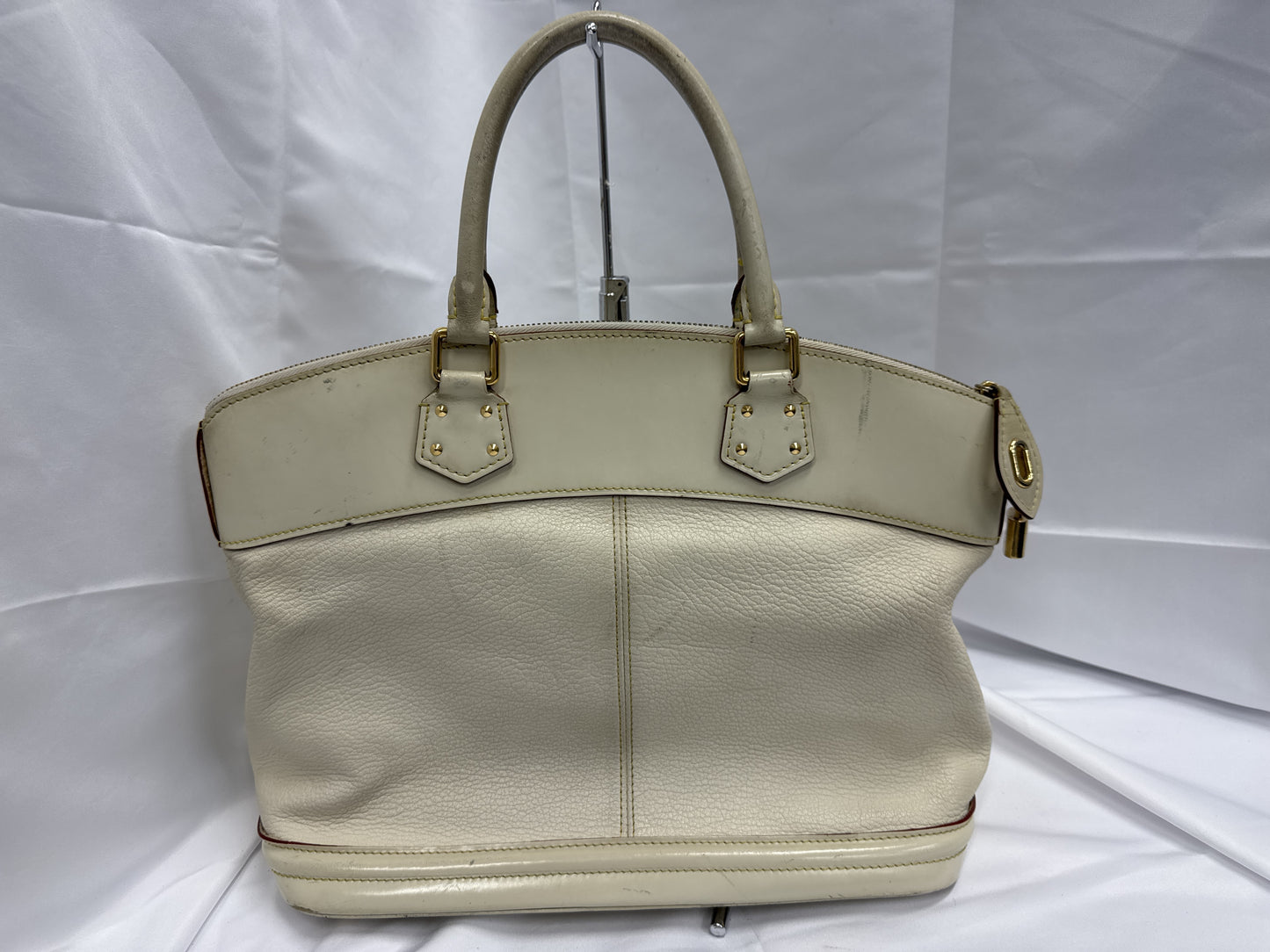 LOUIS VUITTON Suhali Lockit MM Bron Handbag