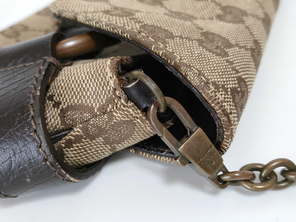 GUCCI GG Canvas Shoulder Bag with Horsebit Hardware and GG Pattern