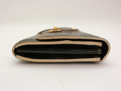 LOUIS VUITTON Suhali Favori Wallet