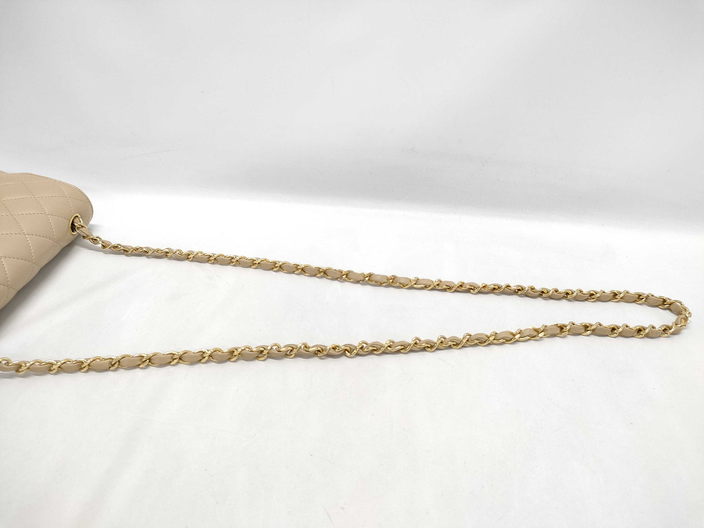CHANEL Matelasse Shoulder Bag in Beige Lambskin