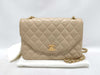 CHANEL Matelasse Shoulder Bag in Beige Lambskin
