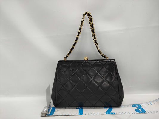 CHANEL Matelasse Chain Shoulder Bag with Clasp Closure, Lambskin, Black
