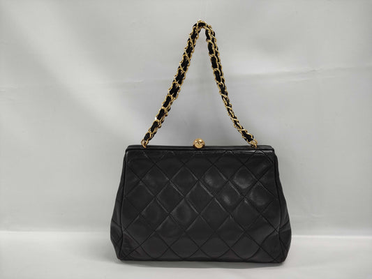 CHANEL Matelasse Chain Shoulder Bag with Clasp Closure, Lambskin, Black