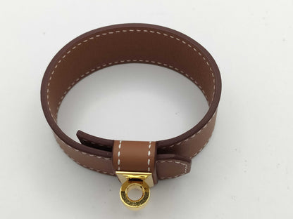 HERMES Kelly Twist PM Swift Gold U-Stamped Bracelet/Bangle