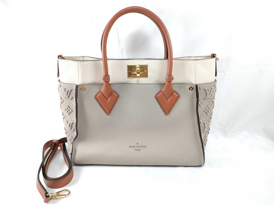 LOUIS VUITTON RFID Verified, Serial Unverifiable. Louis Vuitton On My Side MM Galle 2-Way Handbag/Shoulder Bag M53825.