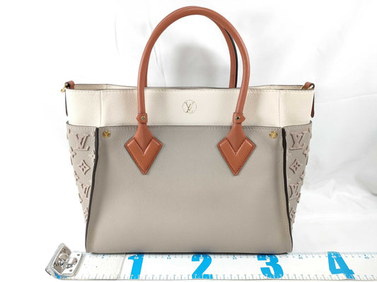 LOUIS VUITTON RFID Verified, Serial Unverifiable. Louis Vuitton On My Side MM Galle 2-Way Handbag/Shoulder Bag M53825.
