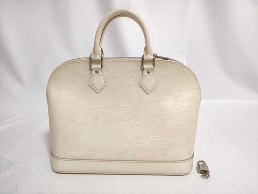 LOUIS VUITTON Epi Louis Vuitton Epi Alma Handbag