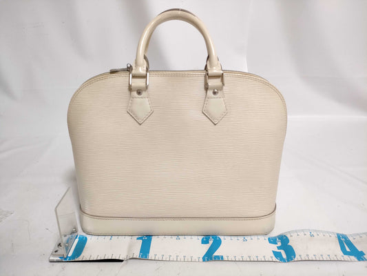 LOUIS VUITTON Epi Louis Vuitton Epi Alma Handbag
