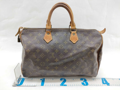 LOUIS VUITTON Monogram Louis Vuitton Speedy Handbag