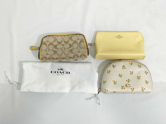 COACH 3-piece pouch set