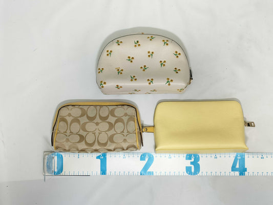 COACH 3-piece pouch set