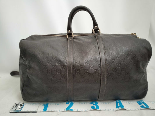 GUCCI Guccissima 2-way Boston bag with GG pattern and 206500 leather.