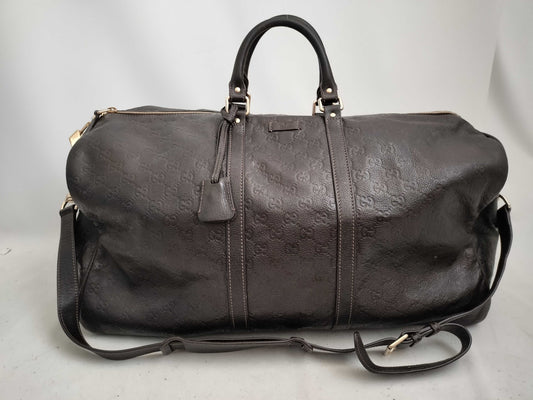 GUCCI Guccissima 2-way Boston bag with GG pattern and 206500 leather.
