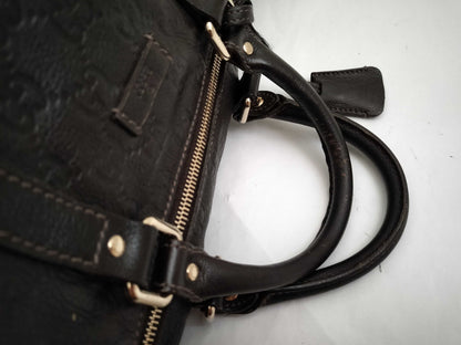 GUCCI Guccissima 2-way Boston bag with GG pattern and 206500 leather.