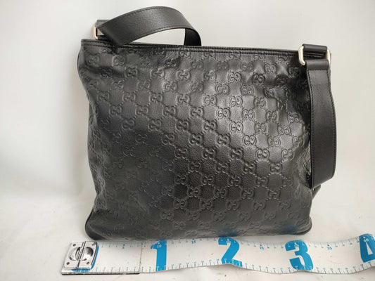 GUCCI Guccissima Leather Shoulder Bag with GG Pattern and Logo Plate 201446
