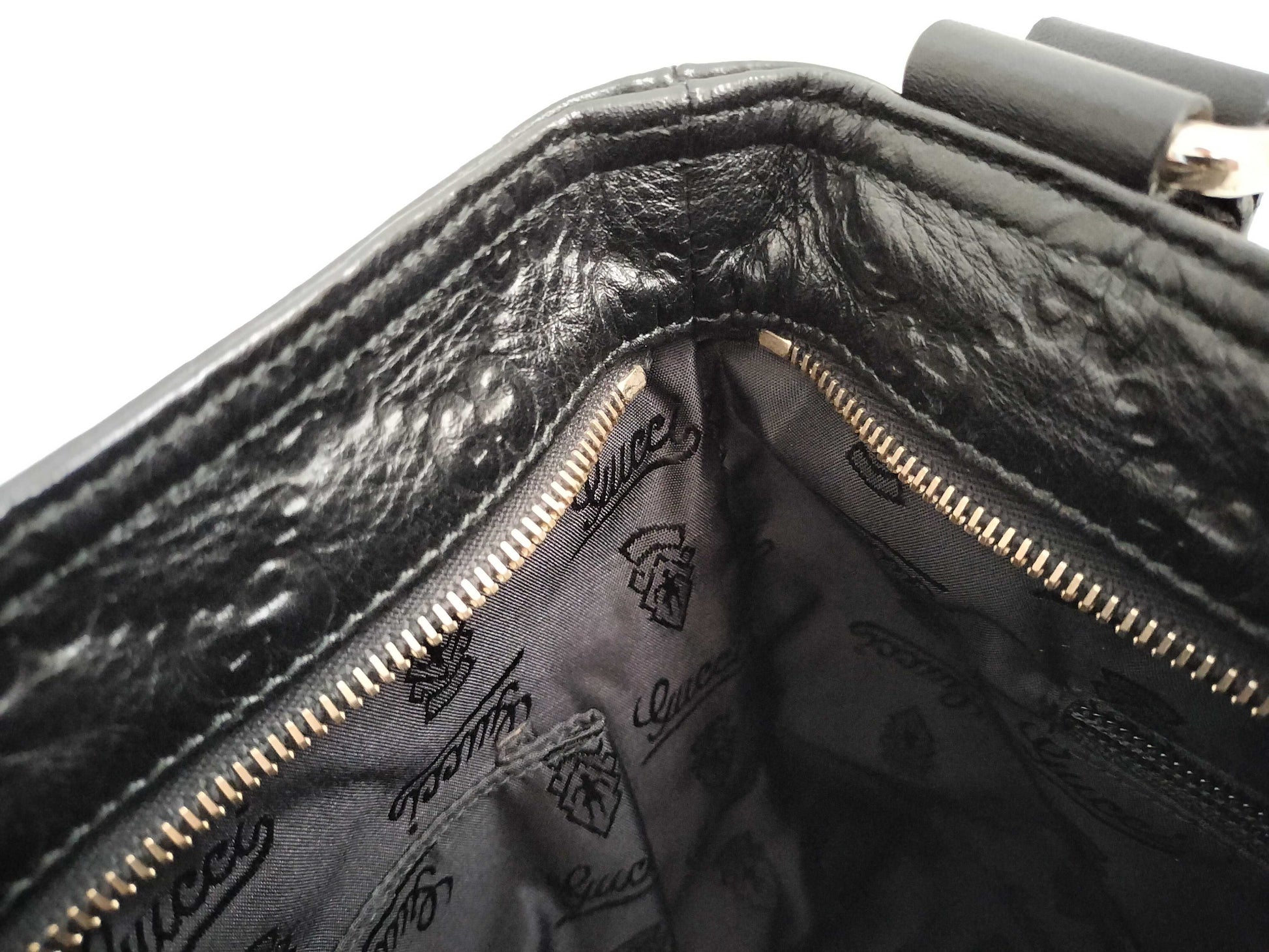 GUCCI Guccissima Leather Shoulder Bag with GG Pattern and Logo Plate 201446