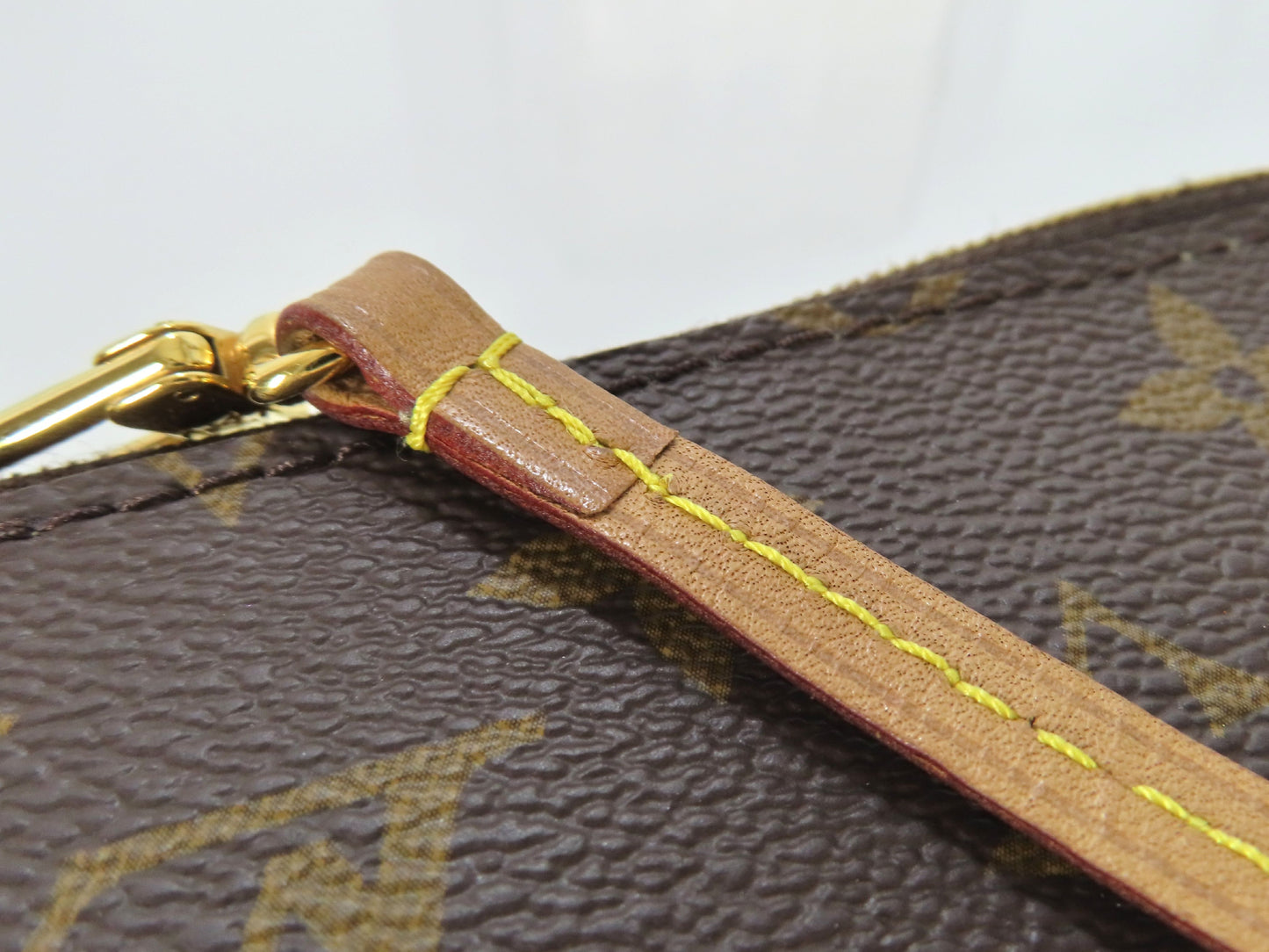 LOUIS VUITTON Unconfirmed Louis Vuitton Monogram Neverfull Pouch with ST