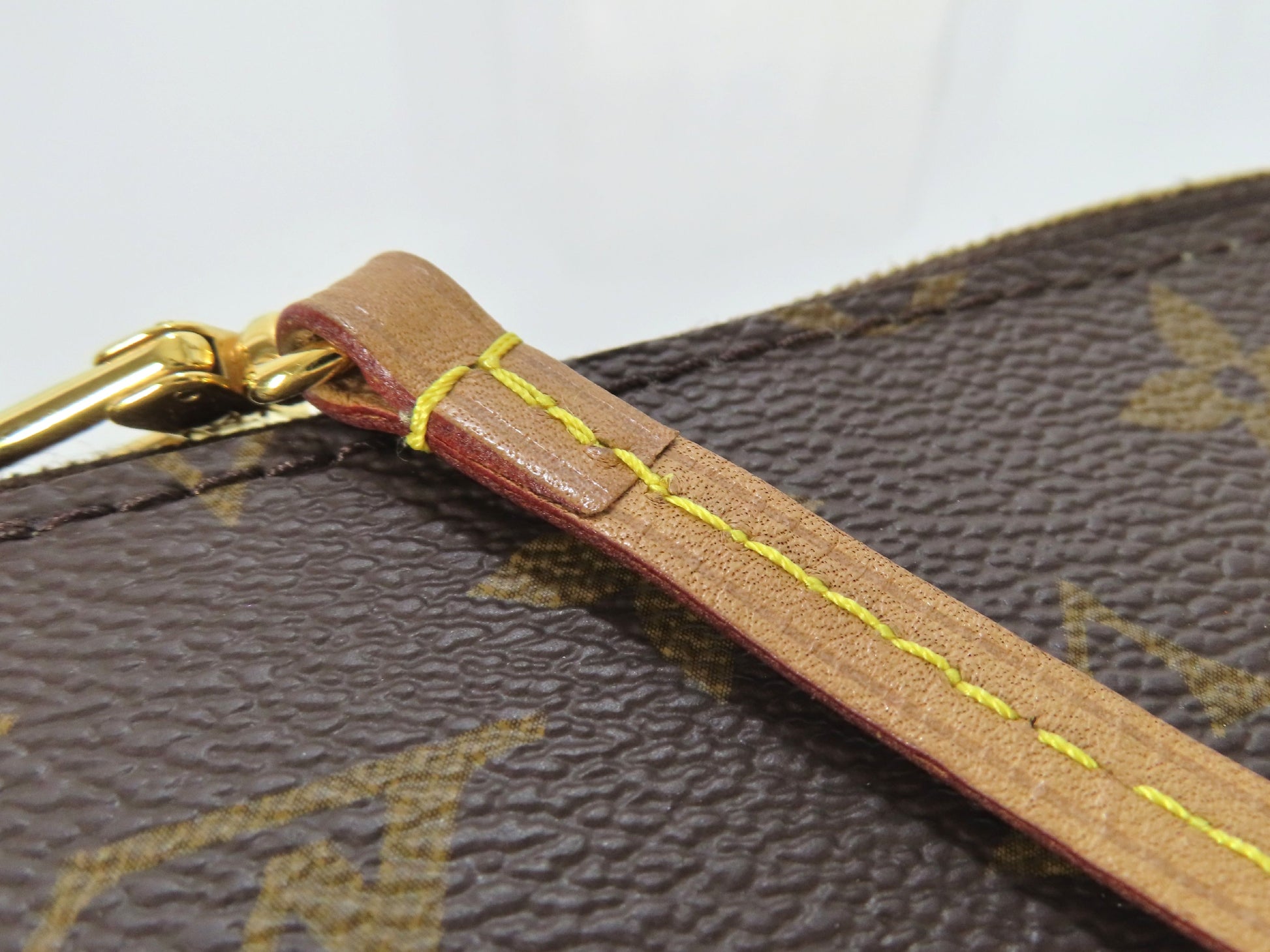 LOUIS VUITTON Unconfirmed Louis Vuitton Monogram Neverfull Pouch with ST