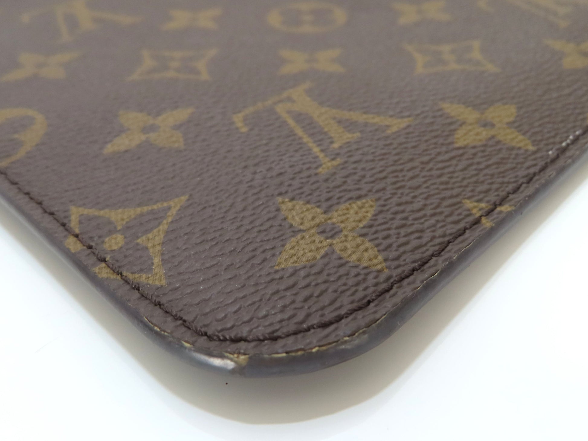 LOUIS VUITTON Unconfirmed Louis Vuitton Monogram Neverfull Pouch with ST