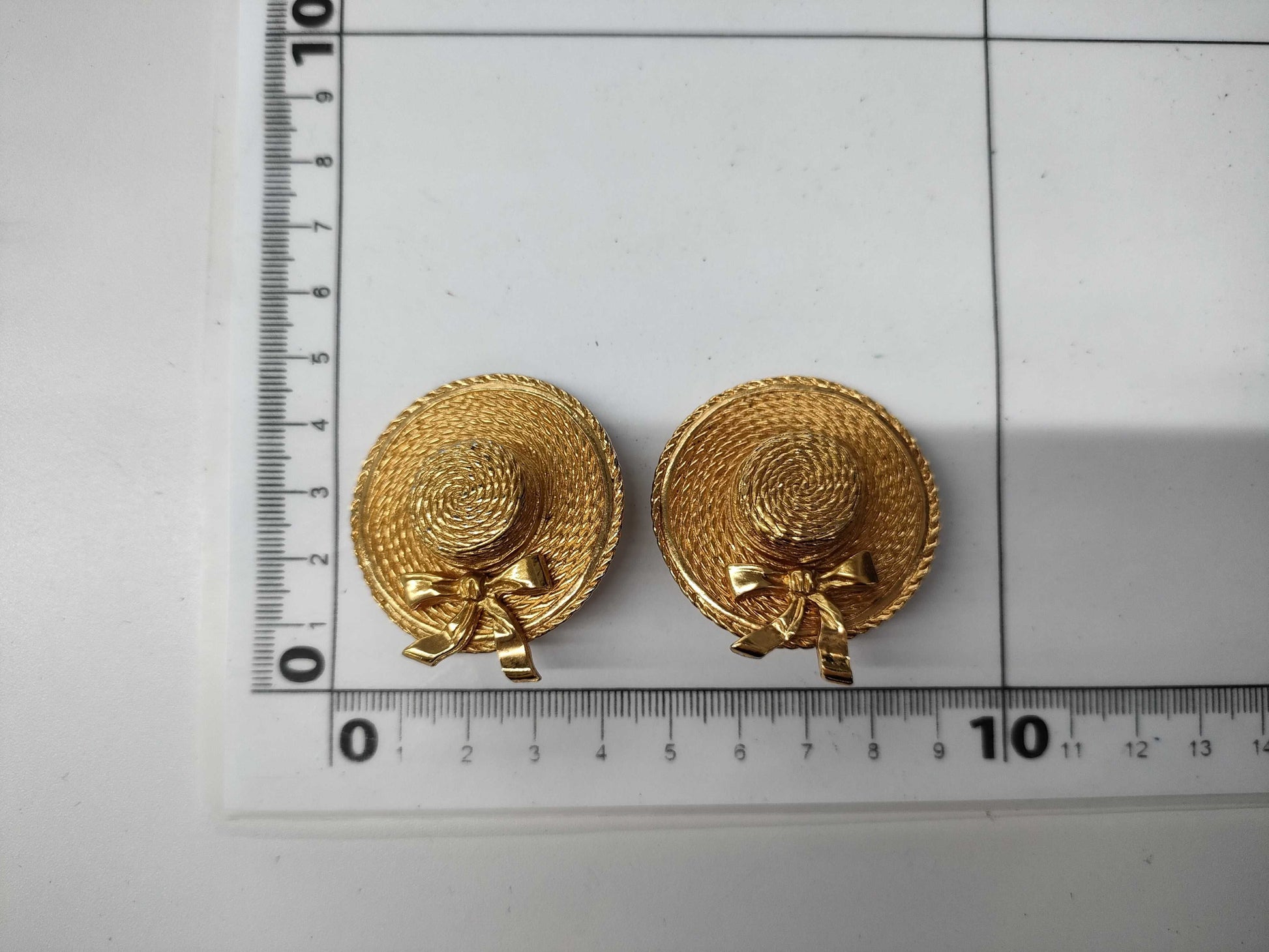 CHANEL engraved plate straw hat ribbon earrings