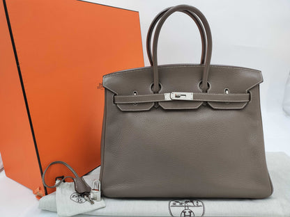 HERMES Birkin 35 in Taurillon Clemence Etoupe leather with silver hardware, N stamped.