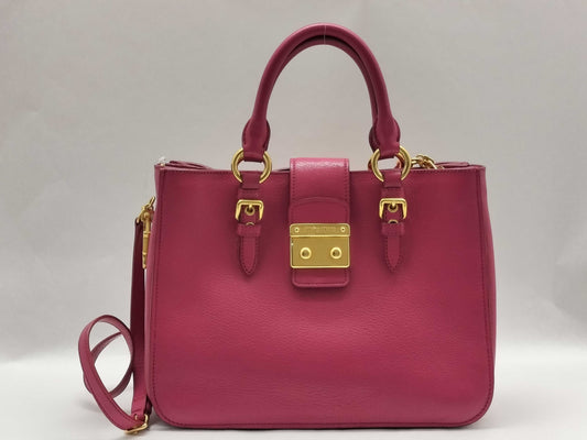 Miu Miu Miu Miu Push Lock Tote in Fuchsia Grained Calfskin Leather with Gold 197 B Shoulder Bag