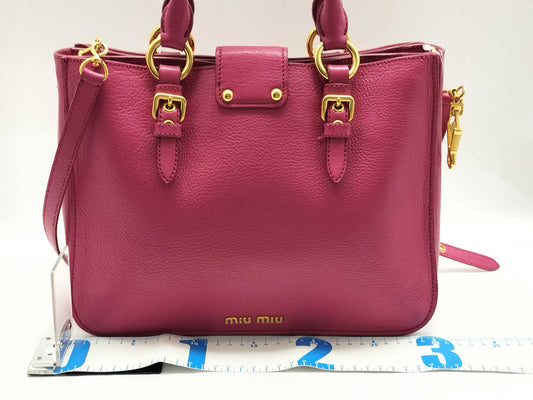 Miu Miu Miu Miu Push Lock Tote in Fuchsia Grained Calfskin Leather with Gold 197 B Shoulder Bag