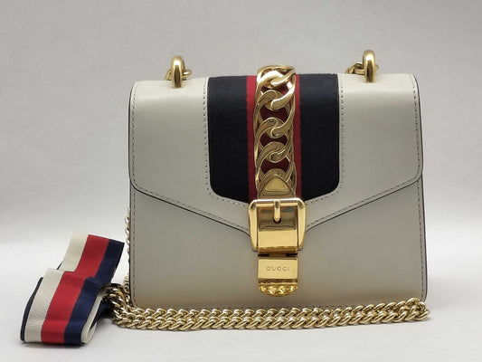 GUCCI Mini Sylvie Chain Bag in Ivory Calfskin Leather with Gold Finish 