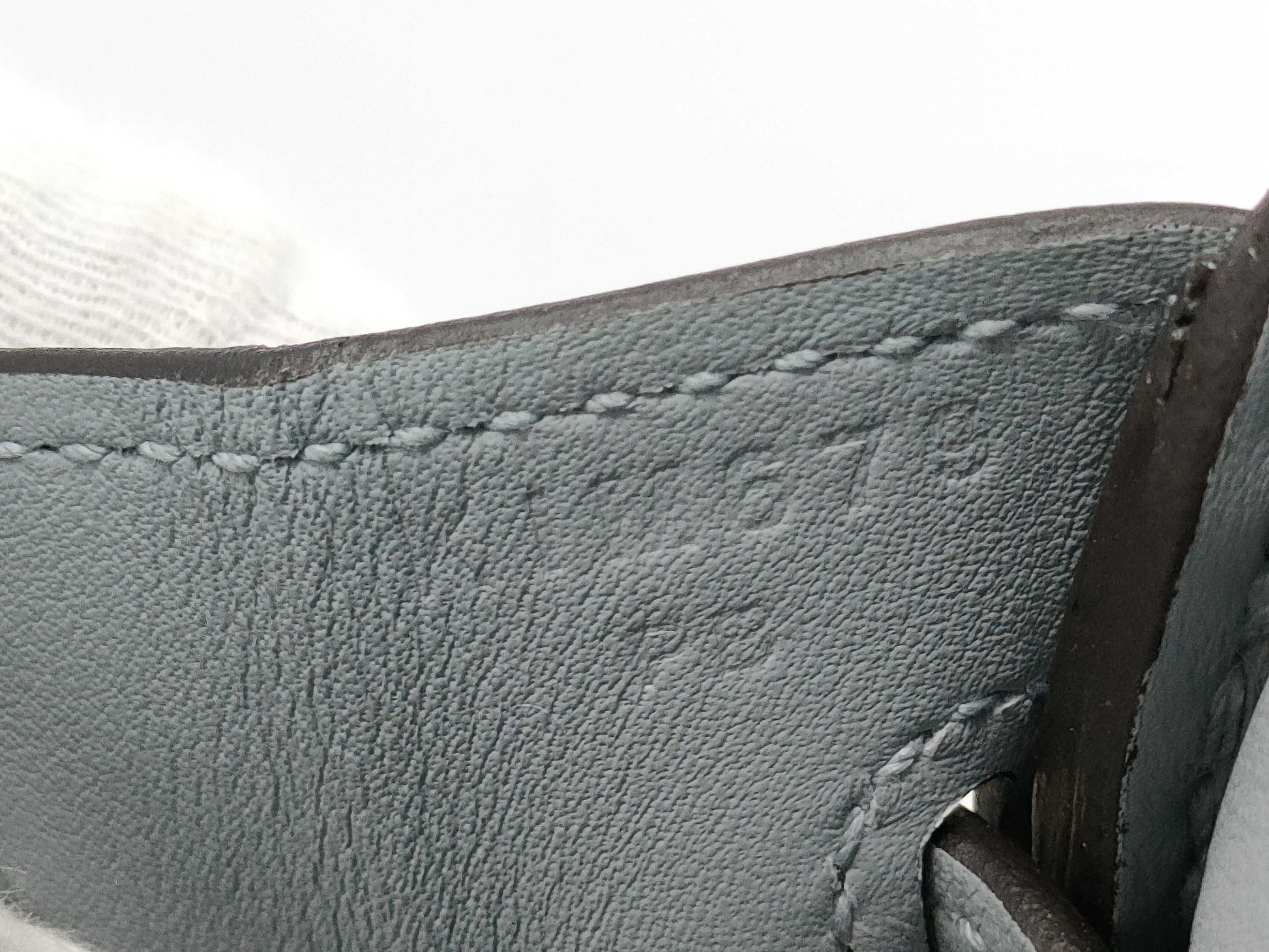 HERMES Birkin 25 in Platinum with Swift Champagne Gold Hardware and K Stamp.