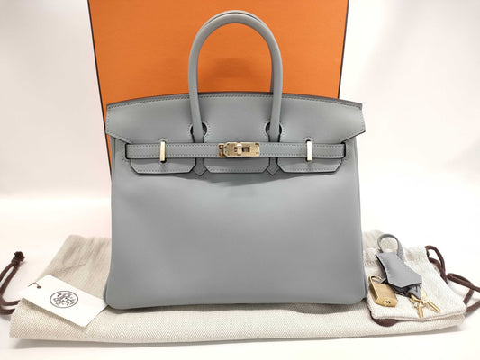 HERMES Birkin 25 in Platinum with Swift Champagne Gold Hardware and K Stamp.
