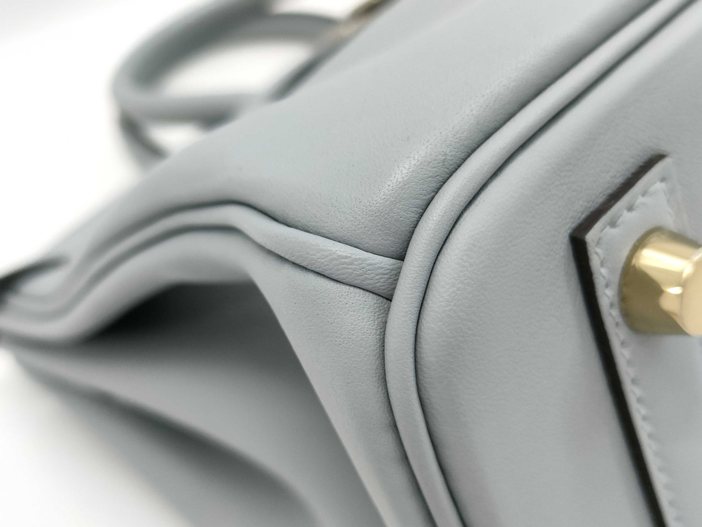 HERMES Birkin 25 in Platinum with Swift Champagne Gold Hardware and K Stamp.