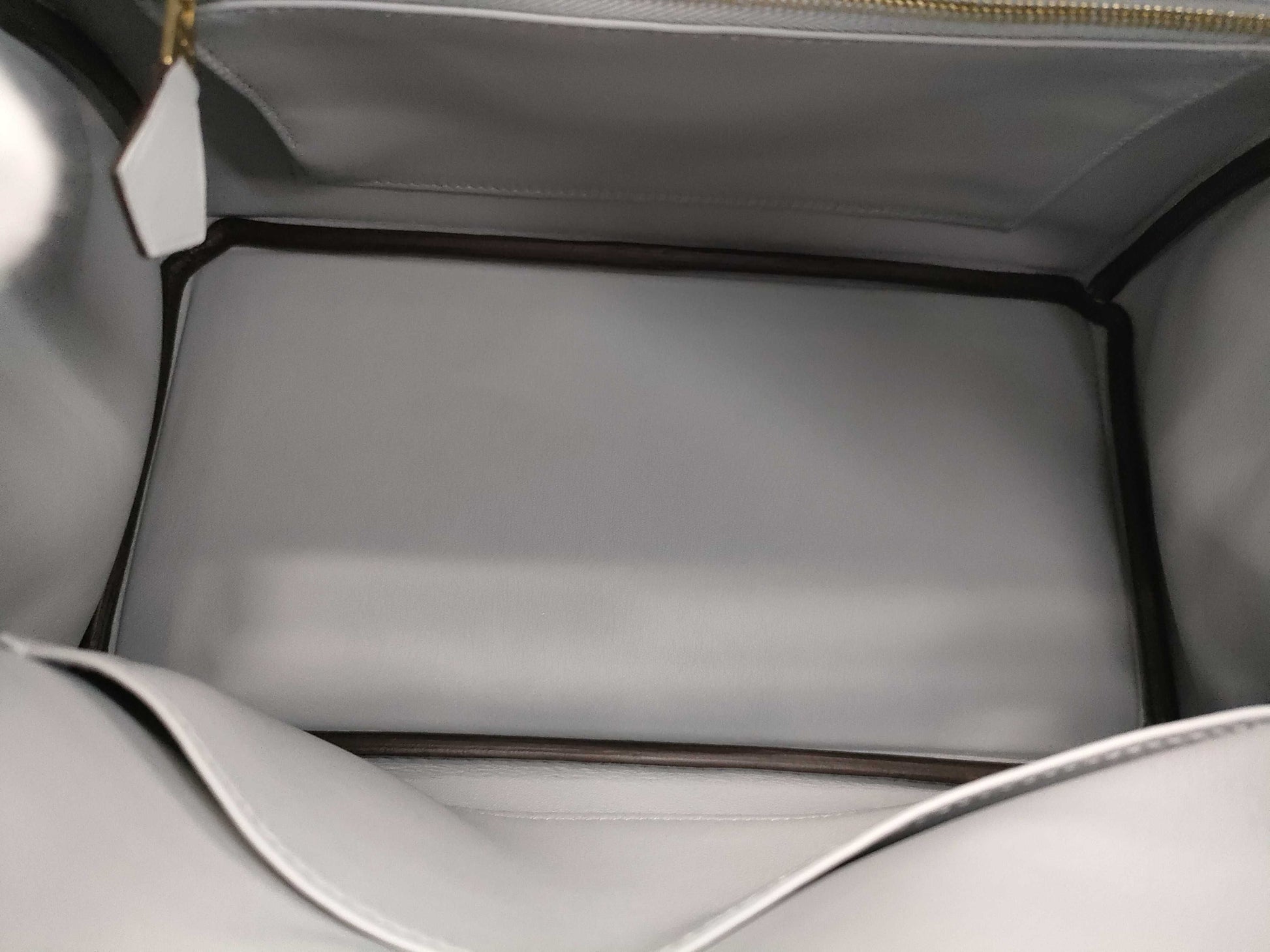 HERMES Birkin 25 in Platinum with Swift Champagne Gold Hardware and K Stamp.