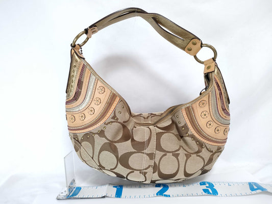 COACH Signature Canvas Hobo Shoulder Bag with Leather Embellishments, Brown