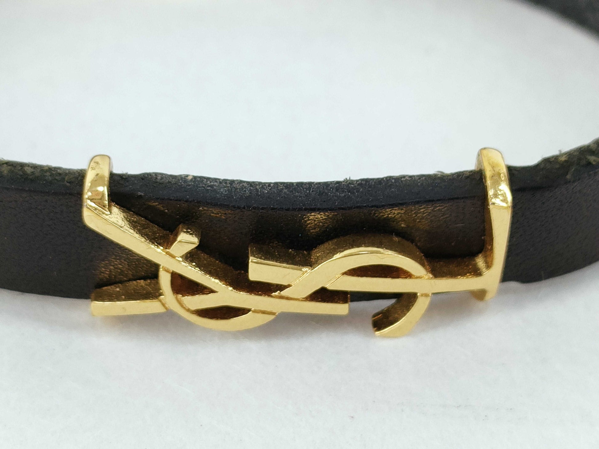 Yves Saint Laurent Cassandra Logo Bracelet in Leather, Black and Gold