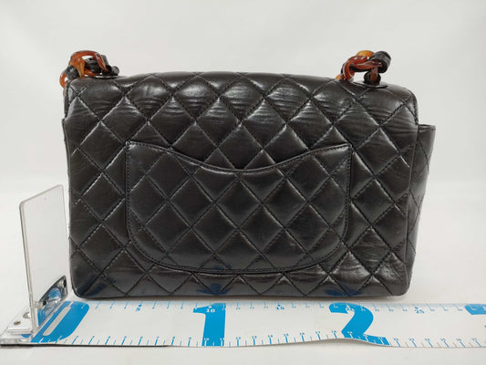 CHANEL Lambskin Tortoiseshell Plastic Chain Shoulder Bag in Black