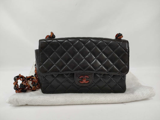 CHANEL Lambskin Tortoiseshell Plastic Chain Shoulder Bag in Black