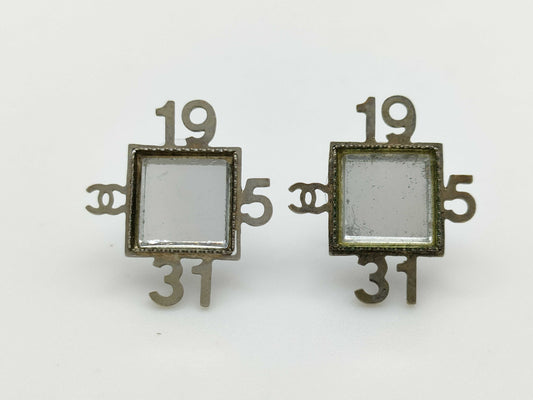 CHANEL Chanel engraved 99P earrings