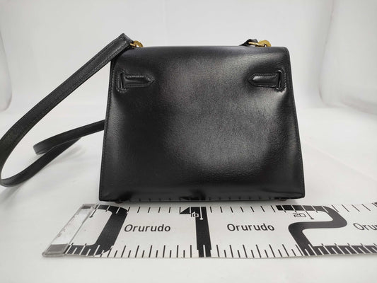 HERMES Mini Kelly Shoulder Bag in Black Box Calf Leather with Gold Hardware and Turn Lock Protection Seal