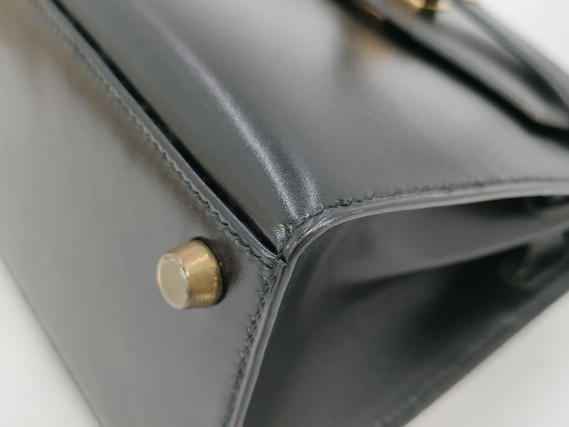 HERMES Mini Kelly Shoulder Bag in Black Box Calf Leather with Gold Hardware and Turn Lock Protection Seal