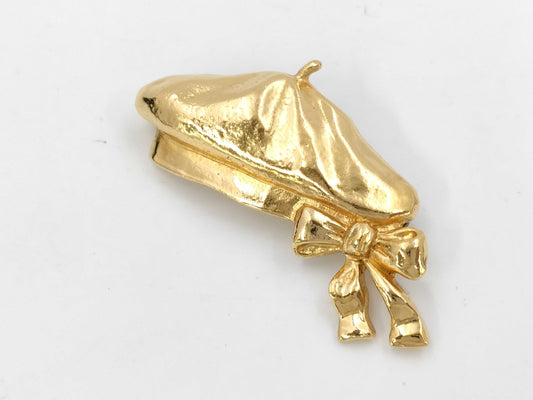 CHANEL beret brooch