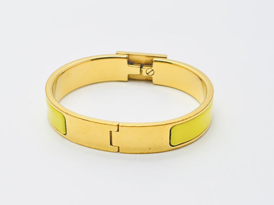 HERMES Click Annau Bracelet in Yellow and Gold