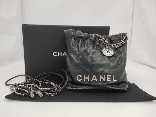 CHANEL Chanel 22 Mini Black Shoulder Bag with Silver Hardware and GP Serial Plate 
