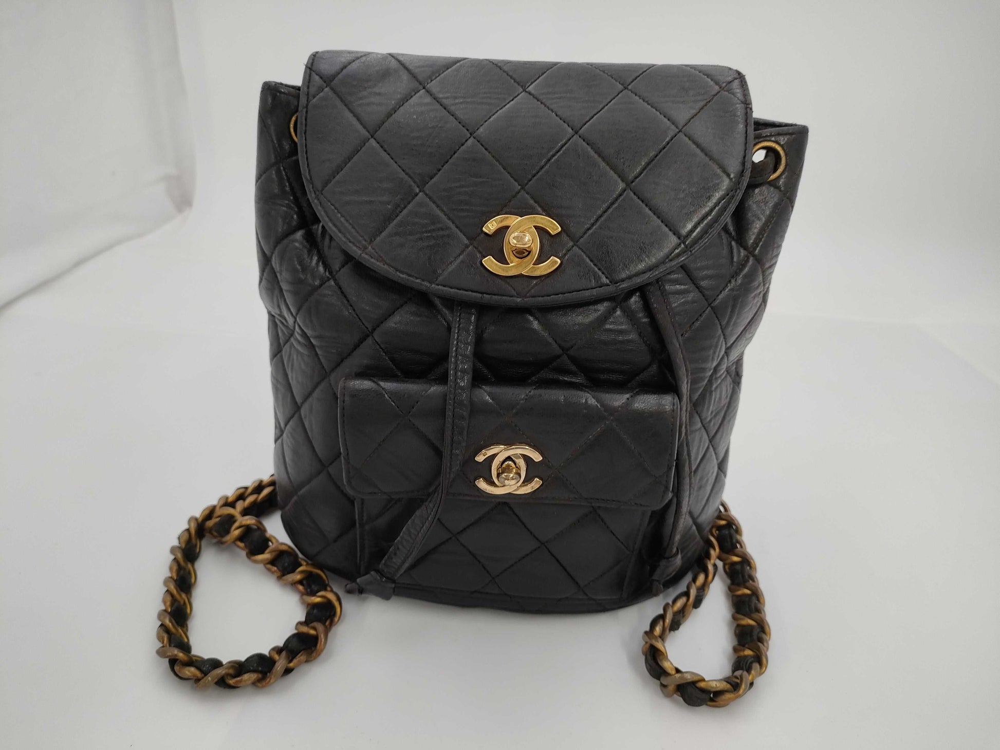 CHANEL Matelasse Lambskin Chain Backpack in Black with Gold Hardware