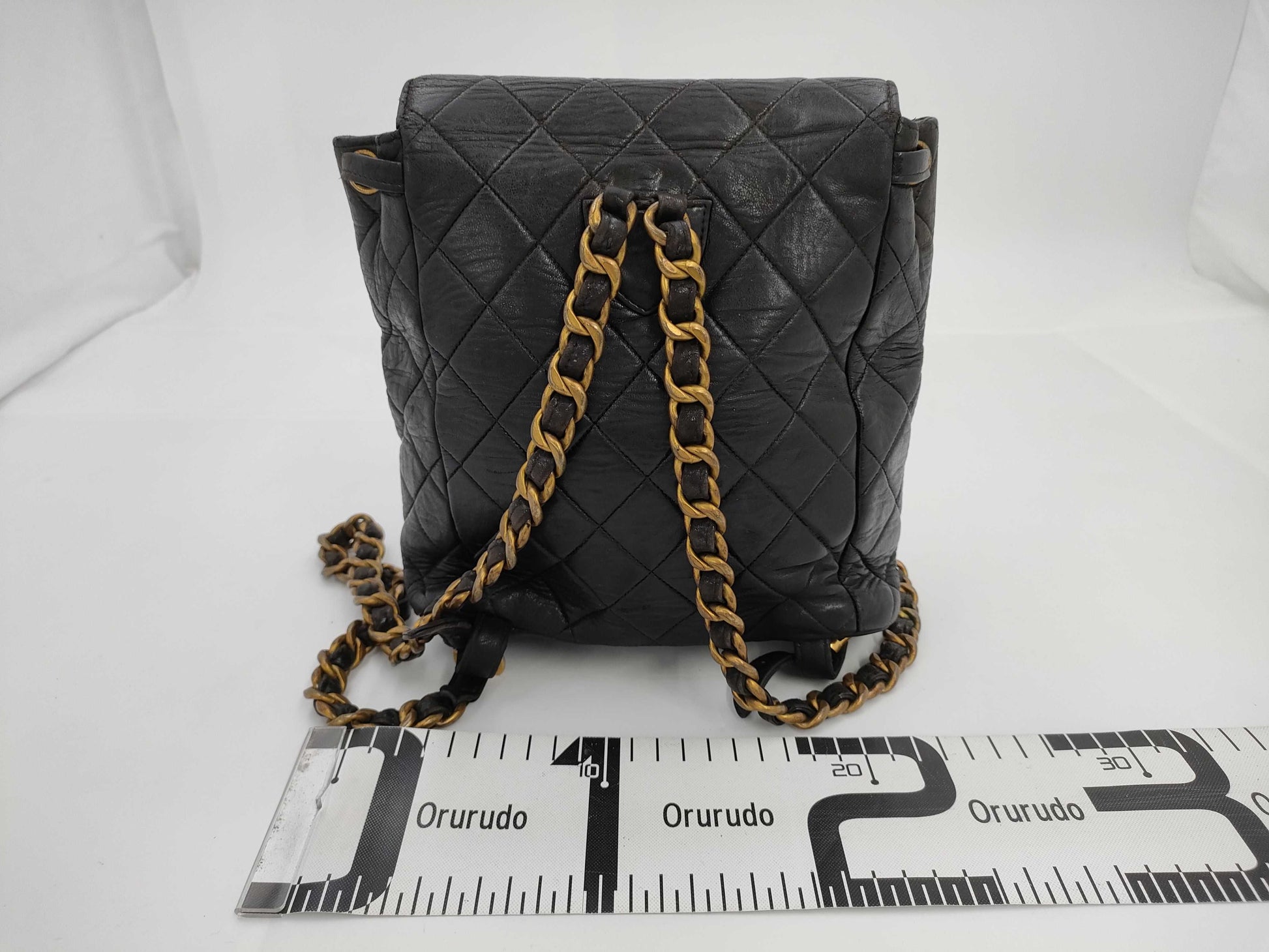 CHANEL Matelasse Lambskin Chain Backpack in Black with Gold Hardware